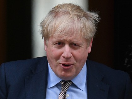 Britain's Prime Minister Boris Johnson leaves from 10 Downing Street in London on February 11, 2020, before heading to the House of Commons where he is expected to make a statement. - British Prime Minister Boris Johnson was set Tuesday to announce his plans for the HS2 high-speed railway, with …