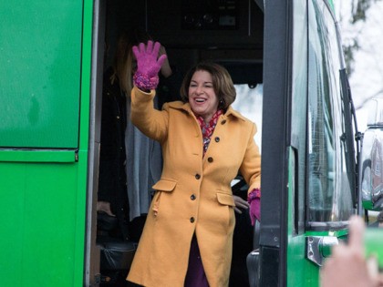 MANCHESTER, NH - FEBRUARY 11: Democratic presidential candidate Sen. Amy Klobuchar (D-MN) reacts as she gets off her campaign bus to visit the polling location at Webster Elementary School during the primary election on February 11, 2020 in Manchester, New Hampshire. (Photo by Scott Eisen/Getty Images)