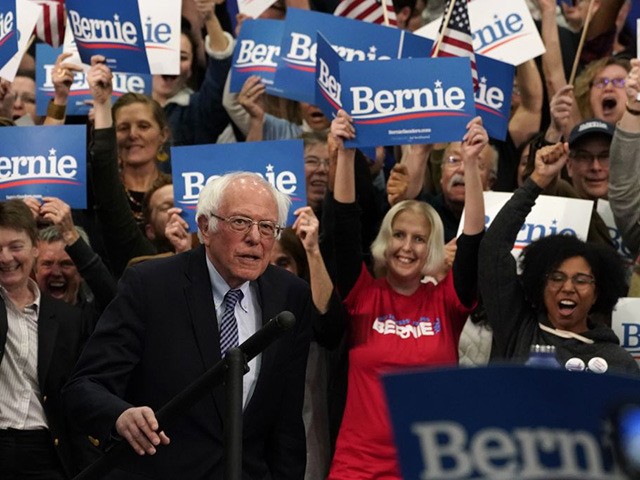 Democratic presidential hopeful Vermont Senator Bernie Sanders arrives to speak at a Primary Night event at the SNHU Field House in Manchester, New Hampshire on February 11, 2020. - Bernie Sanders held a slim lead in New Hampshire's high-stakes Democratic primary, leaving rivals including party stalwart Joe Biden in his …