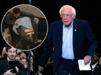 (INSET: Video of fight) Democratic presidential candidate Vermont Senator Bernie Sanders walks onto the stage at the beginning of a campaign rally in Denver, Colorado on February 16, 2020. (Photo by Jason Connolly / AFP) (Photo by JASON CONNOLLY/AFP via Getty Images)