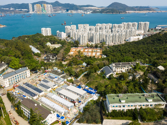 An aerial photo shows Lei Yue Mun Park and Holiday Village, the city's largest quarantine site, which is being used to house people identified as having contact with confirmed cases of the COVID-19 coronavirus, in Hong Kong on February 17, 2020. (Photo by Anthony WALLACE / AFP) (Photo by ANTHONY …