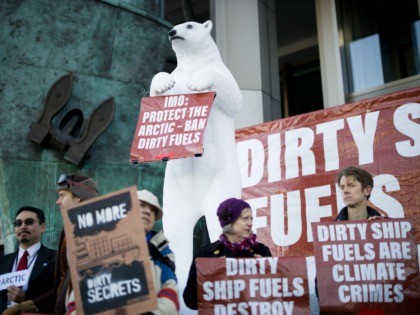Activists from the Extinction Rebellion climate action group protest outside the International Maritime Organisation in London on February 17, 2020 against pollution in the Arctic due to the global shipping industry as delegates meet for the International Maritime Organizations week long Pollution Prevention & Response sub-committee (PPR7) meeting. (Photo by …