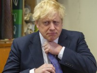 Britain's Prime Minister Boris Johnson visits homeless charity The Connection At St Martin's in London on February 27, 2020. - Located in central London the centre provides immediate relief and support for the homeless and long-term support leading to housing, work and independence. (Photo by Tim CLARKE / POOL / …