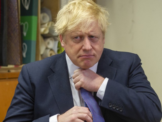 Britain's Prime Minister Boris Johnson visits homeless charity The Connection At St M