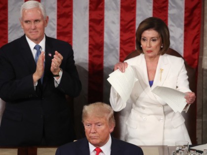 WASHINGTON, DC - FEBRUARY 04: House Speaker Rep. Nancy Pelosi (D-CA) rips up pages of the