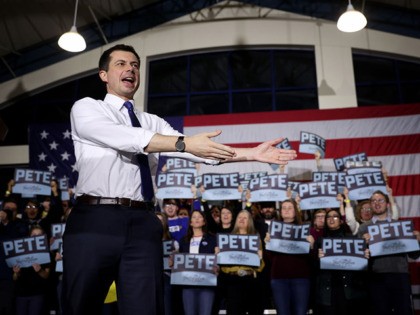 EXETER, NEW HAMPSHIRE - FEBRUARY 10: Democratic presidential candidate former South Bend, Indiana Mayor Pete Buttigieg arrives on stage at a Get Out the Vote rally at Exeter High School February 10, 2020 in Exeter, New Hampshire. New Hampshire holds its first in the nation primary tomorrow. (Photo by Win …