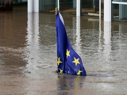HEREFORD, ENGLAND - FEBRUARY 17: An EU flag flying outside a house is partially covered by the flooding of the River Wye following Storm Dennis on February 17, 2020 in Hereford, England. Storm Dennis is the second named storm to bring extreme weather in a week and follows in the …