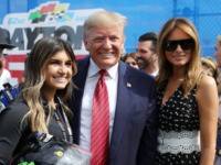 DAYTONA BEACH, FLORIDA - FEBRUARY 16: U.S. President Donald Trump and First Lady Melania Trump pose for a photo with Hailie Deegan prior to the NASCAR Cup Series 62nd Annual Daytona 500 at Daytona International Speedway on February 16, 2020 in Daytona Beach, Florida. (Photo by Chris Graythen/Getty Images)