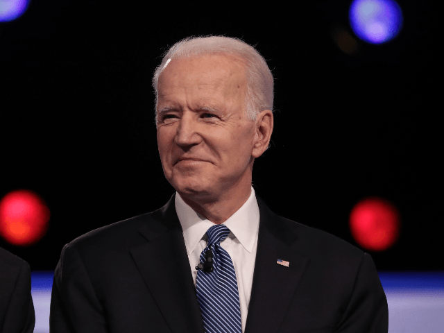 Democratic presidential candidate former Vice President Joe Biden arrives on stage for the