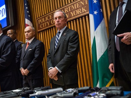 NEW YORK, NY - AUGUST 19: New York City Mayor Michael Bloomberg (2nd R) and New York Police Department (NYPD) Commissioner Ray Kelly (3rd R) attend a press conference to announce the an operation that seized the largest number of illegal guns in the city's history on August 19, 2013 …