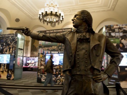 A bronze statue of Alexander Hamilton, appointed the first secretary of the treasury by US President George Washington, in a pose recreating his duel against then US Vice President Aaron Burr on display at the Museum of American Finance December 17, 2013 in New York. Hamilton was mortally wounded in …