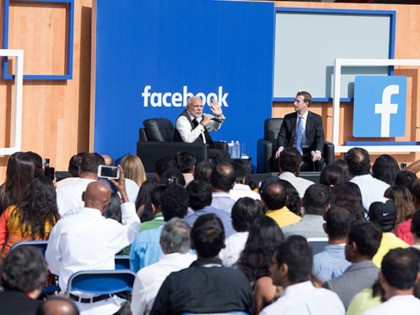 Indian Prime Minister Narendra Modi (L) and Facebook CEO Mark Zuckerberg attend a Townhall