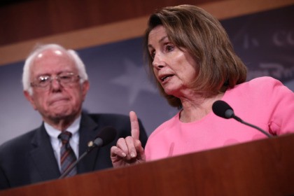 WASHINGTON, DC - MAY 23: House Minority Leader Nancy Pelosi (R) answers questions with U.