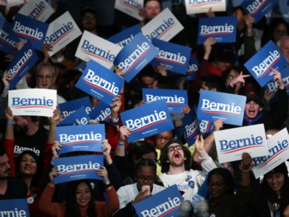 Supporters of Democratic presidential candidate Sen. Bernie Sanders (I-VT) cheer during his caucus night watch party on February 03, 2020 in Des Moines, Iowa. Iowa is the first contest in the 2020 presidential nominating process with the candidates then moving on to New Hampshire. (Photo by Alex Wong/Getty Images)