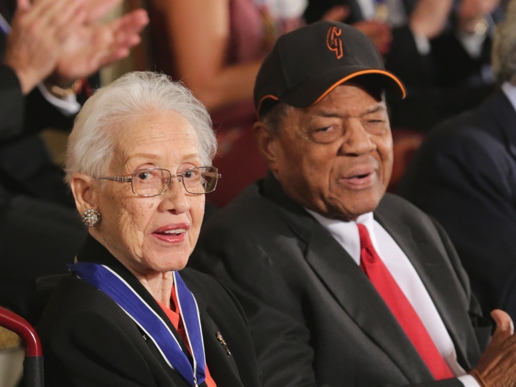 WASHINGTON, DC - NOVEMBER 24: Pioneering NASA mathematician Katherine Johnson (L) and Baseball Hall of Famer Willie Mays are presented with the Presidential Medal of Freedom during a ceremony in the East Room of the White House November 24, 2015 in Washington, DC. Obama presented the medal to thirteen living and four posthumous pioneers in science, sports, public service, human rights, politics and arts, (Photo by Chip Somodevilla/Getty Images)
