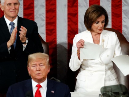 House Speaker Nancy Pelosi of Calif., tears her copy of President Donald Trump's s State o