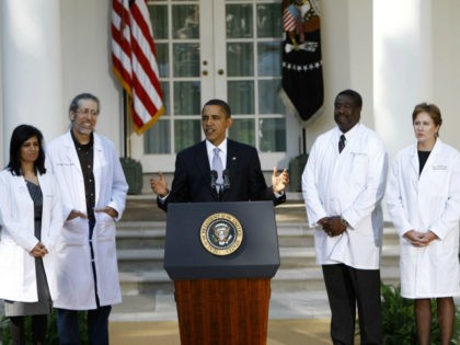 U.S. President Barack Obama speaks as doctors look on in the Rose Garden at the White House on October 5, 2009 in Washington, DC. Obama was meeting doctors from all over the country who are joining him in pushing for health insurance reform. (Photo by Win McNamee/Getty Images)