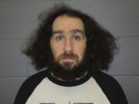 Authorities arrested Patrick Bradley, who was accused of assaulting three people at a polling station this week, including a teen wearing a "Make America Great Again" (MAGA) hat.