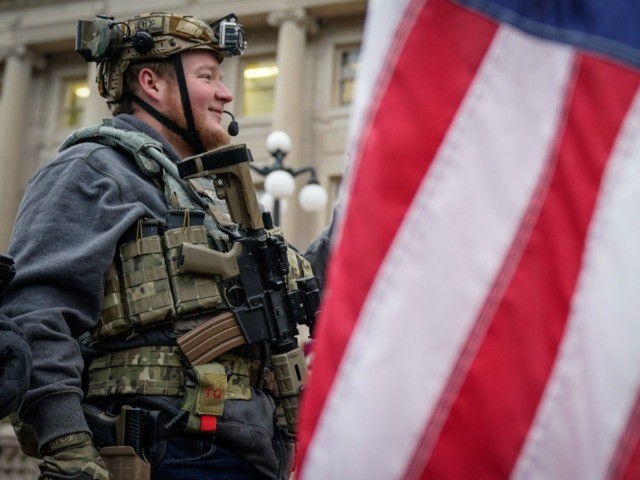 FRANKFORT, KY - JANUARY 31: A supporter of the Second Amendment carries a semi-automatic rifle during a rally in support of the Second Amendment at the State Capitol on January 31, 2020 in Frankfort, Kentucky. Advocates from across the state gathered at the Kentucky Capitol in support of the Second …
