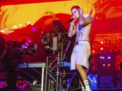 Slowthai performs with Flume on day four of Lollapalooza in Grant Park on Sunday, Aug. 4, 2019, in Chicago. (Photo by Amy Harris/Invision/AP)