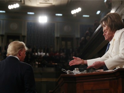 U.S. President Donald Trump turns away as House Speaker Nancy Pelosi reaches out to shake his hand before the State of the Union address in the House chamber on February 4, 2020 in Washington, DC. Trump is delivering his third State of the Union address on the night before the …