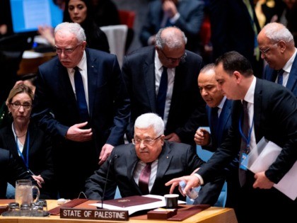 Palestinian president Mahmud Abbas (C) arrives at the UN Security Council at the United Na