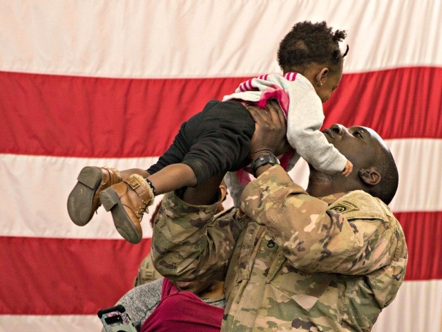 A soldier reunites with his daughter at Fort Bragg, N.C. after returning from the Middle East. The 82nd Airborne Division's Immediate Response Force had been deployed since New Years Eve. Thursday, Feb. 20, 2020. Nearly two months after a U.S. Army rapid-response force was activated amid tensions with Iran, deploying …