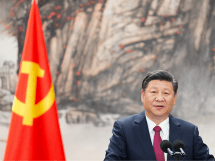 BEIJING, CHINA - OCTOBER 25: Chinese President Xi Jinping speaks at the podium during the unveiling of the Communist Party's new Politburo Standing Committee at the Great Hall of the People on October 25, 2017 in Beijing, China. China's ruling Communist Party today revealed the new Politburo Standing Committee after …