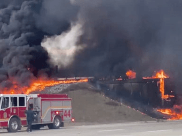 A tanker overturned and caught on fire in the intersection of I-465 and I-70 on Indianapolis' east side on Thursday, Feb. 20, 2020.