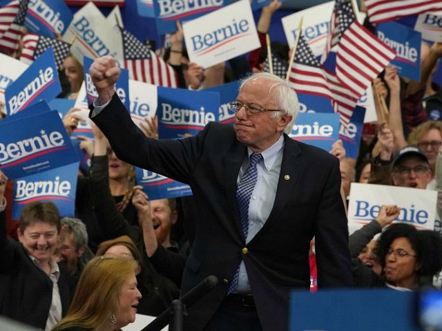Democratic presidential hopeful Vermont Senator Bernie Sanders arrives to speak at a Primary Night event at the SNHU Field House in Manchester, New Hampshire on February 11, 2020. - Bernie Sanders won New Hampshire's crucial Democratic primary, beating moderate rivals Pete Buttigieg and Amy Klobuchar in the race to challenge …