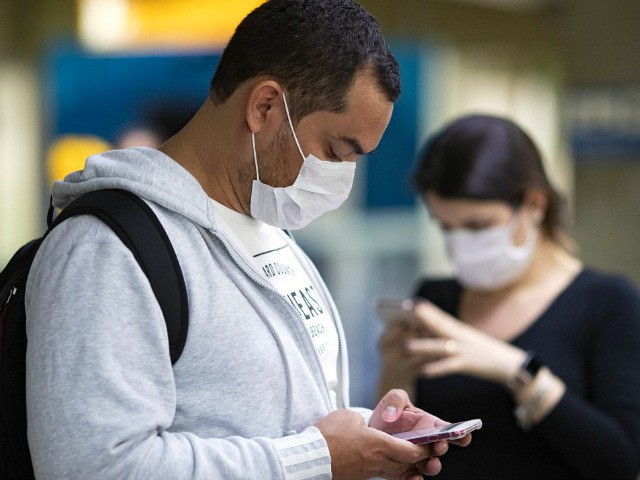 Passengers wearing masks as a precaution against the spread of the new coronavirus COVID-1