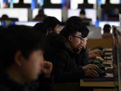 Students studying car mechanics sit an exam in a computer room at a technical school in Jinan, in China's eastern Shandong province on January 29, 2018. (Photo by GREG BAKER / AFP) (Photo credit should read GREG BAKER/AFP via Getty Images)