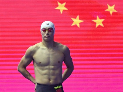 China's Sun Yang preapres for the final of the men's 800m freestyle event during the swimming competition at the 2019 World Championships at Nambu University Municipal Aquatics Center in Gwangju, South Korea, on July 24, 2019. (Photo by Manan VATSYAYANA / AFP) (Photo credit should read MANAN VATSYAYANA/AFP via Getty …