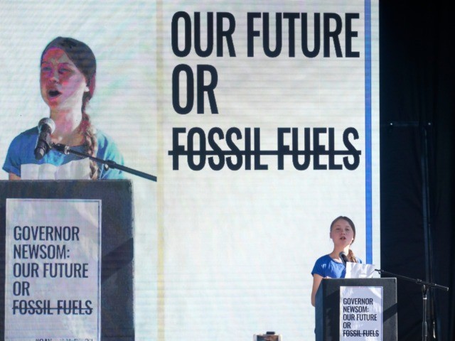 Climate activist Greta Thunberg speaks after a climate change march in Los Angeles, on Friday, Nov. 1, 2019. Thunberg says young people are rallying to fight climate change because their age leaves them with the most to lose from damage to the planet. (AP Photo/Ringo H.W. Chiu)