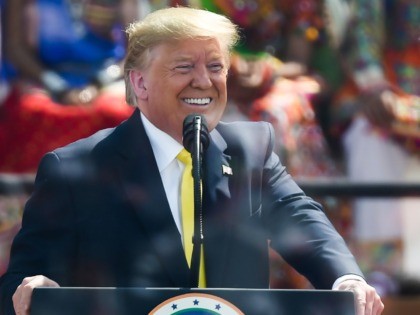 US President Donald Trump smiles while addressing 'Namaste Trump' rally at Sardar Patel St