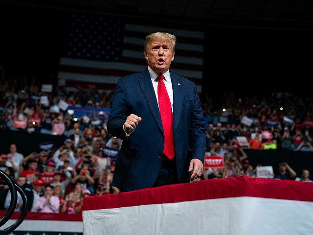 President Donald Trump arrives to speak at a campaign rally at Veterans Memorial Coliseum,