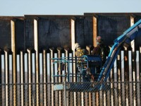 EL PASO, TEXAS - FEBRUARY 12: People work on the U.S./ Mexican border wall on February 12, 2019 in El Paso, Texas. U.S. President Donald Trump visited the border city yesterday as he continues to campaign for more wall to be built along the border. Democrats in Congress are asking …