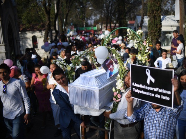 TOPSHOT - The coffin of a seven-year-old girl whose body was found over the week-end with