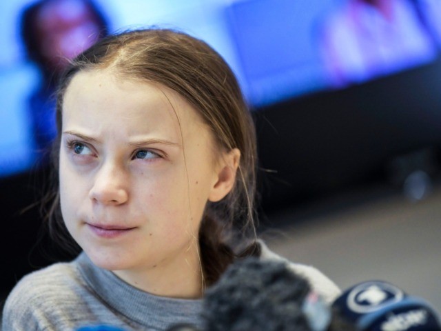 Swedish climate activist Greta Thunberg gives a press conference during a meeting with cli