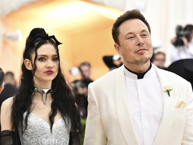 Grimes, left, and Elon Musk attend The Metropolitan Museum of Art's Costume Institute benefit gala celebrating the opening of the Heavenly Bodies: Fashion and the Catholic Imagination exhibition on Monday, May 7, 2018, in New York. (Photo by Charles Sykes/Invision/AP)