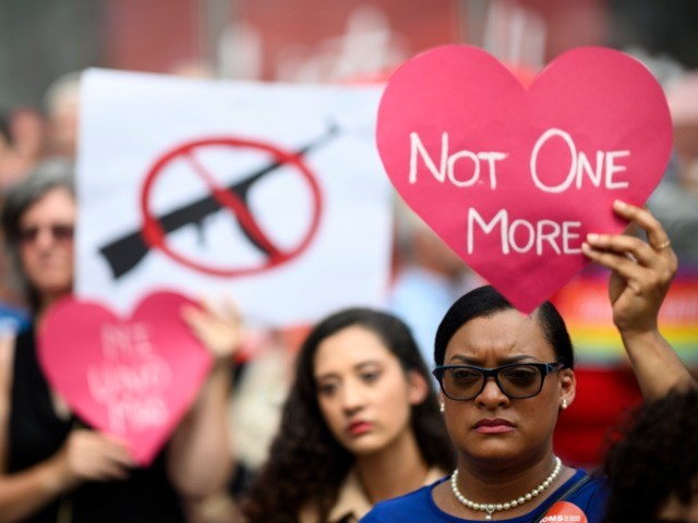 TOPSHOT - Protestors take part in a rally of Moms against gun violence and calling for Federal Background Checks on August 18, 2019 in New York City. (Photo by Johannes EISELE / AFP) (Photo by JOHANNES EISELE/AFP via Getty Images)