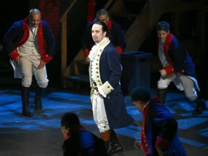 FILE - In this June 12, 2016 file photo, Lin-Manuel Miranda and the cast of "Hamilton" perform at the Tony Awards in New York. Next year, you'll be able to see the original Broadway cast of “Hamilton” perform the musical smash from the comfort of a movie theater. The Walt …