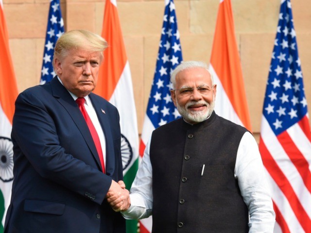India's Prime Minister Narendra Modi (R) shakes hands with US President Donald Trump before a meeting at Hyderabad House in New Delhi on February 25, 2020. (Photo by Prakash SINGH / AFP) (Photo by PRAKASH SINGH/AFP via Getty Images)