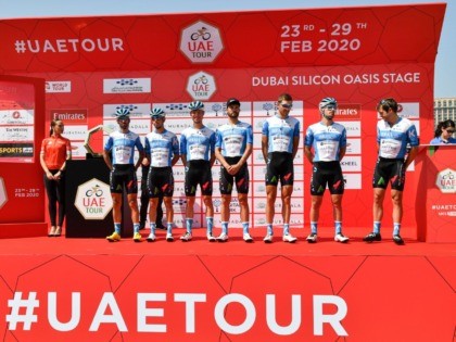 Israel Start-Up Nation cycling team members pose before the start of the first stage of the UAE Tour from the Pointe to Silicon Oasis in Dubai on February 23, 2020. (Photo by Giuseppe CACACE / AFP) (Photo by GIUSEPPE CACACE/AFP via Getty Images)