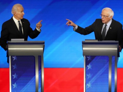 Democratic presidential candidates former Vice President Joe Biden and Sen. Bernie Sanders (I-VT) participate in the Democratic presidential primary debate in the Sullivan Arena at St. Anselm College on February 07, 2020 in Manchester, New Hampshire. Seven candidates qualified for the second Democratic presidential primary debate of 2020 which comes …