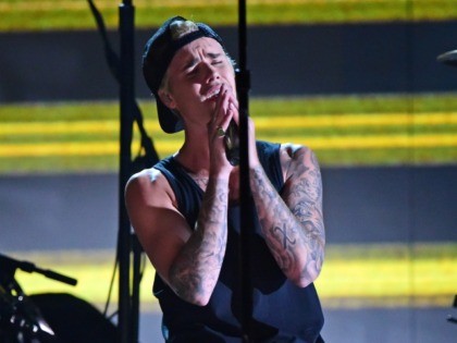 Justin Bieber performs on stage during the 58th Annual Grammy Awards in Los Angeles, Calif