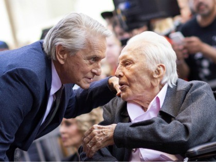 Actor Kirk Douglas (R) attends a ceremony honoring his son actor Michael Douglas (L) with