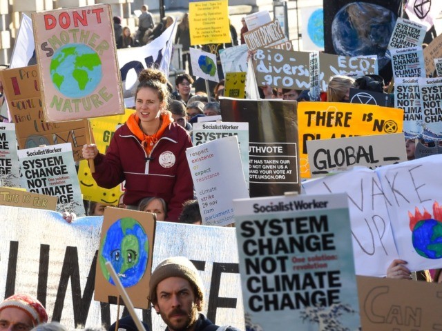 LONDON, ENGLAND - NOVEMBER 29: Students take part in a "Fridays for Future" climate change rally on November 29, 2019 in London, England. The youth strike movement to demand action on climate change started in August 2018, led by the Swedish teenager Greta Thunberg. (Photo by Peter Summers/Getty Images)