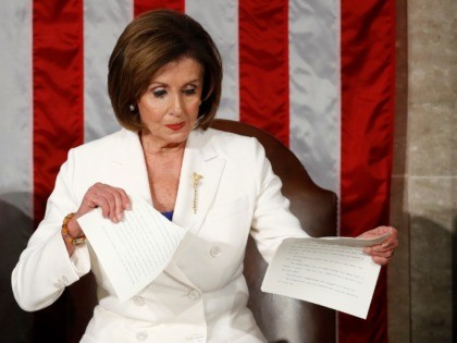 House Speaker Nancy Pelosi of Calif., tears her copy of President Donald Trump's s State o