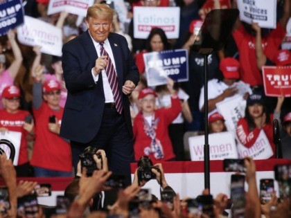 LAS VEGAS, NEVADA - FEBRUARY 21: President Donald Trump gestures to the crowd at a campaig